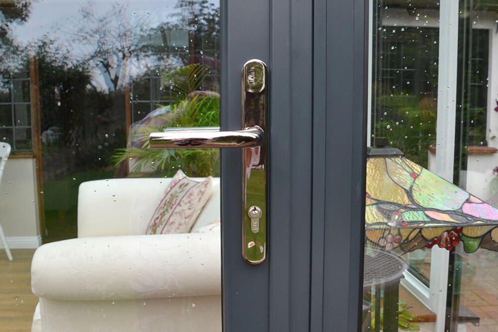 Grey aluminium entrance door and handle