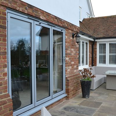 Aluminium Bifold Door finished in Silver Grey